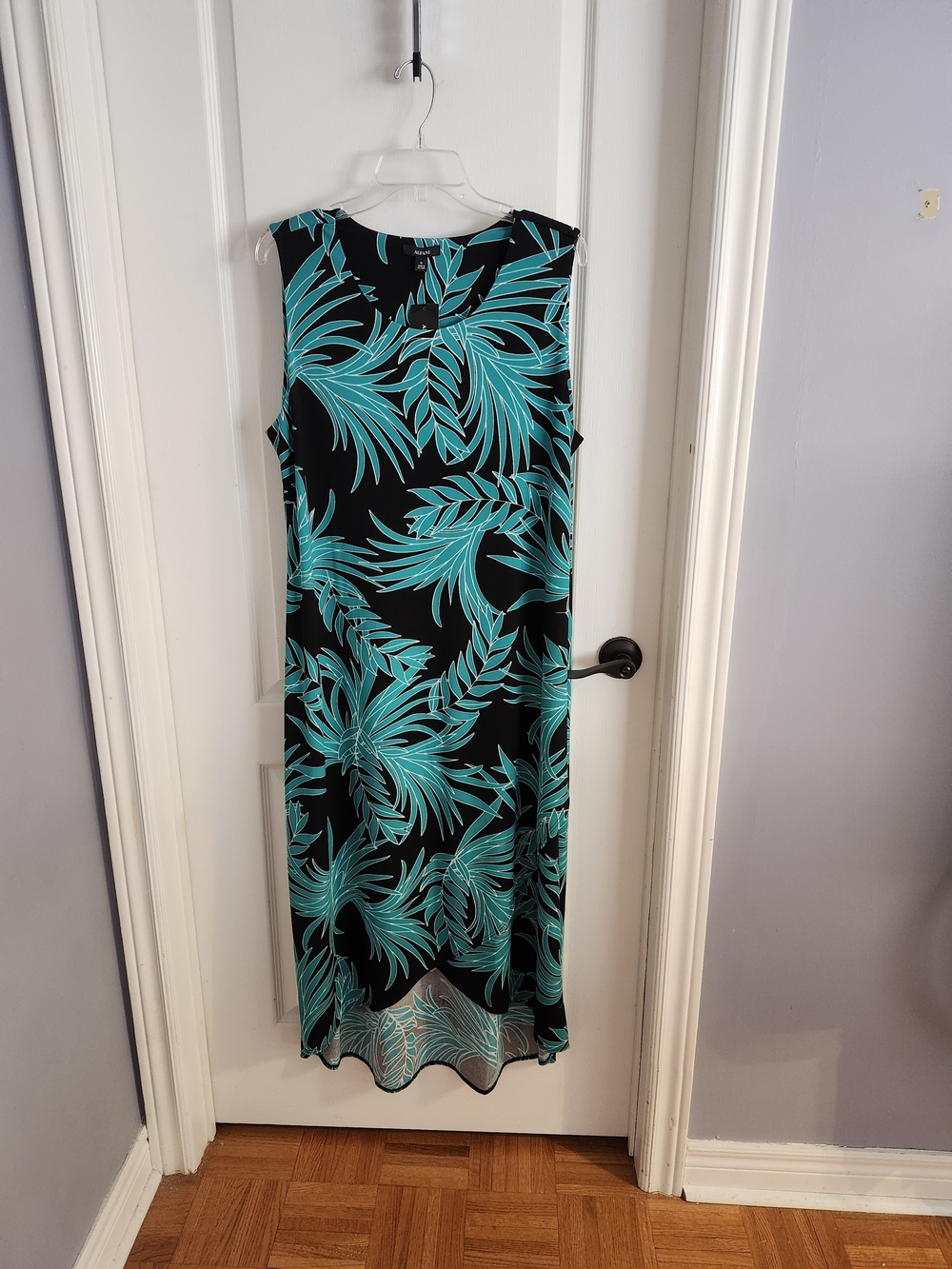 Sleeveless Black Dress with Teal Leaf Print